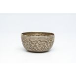 A Thai or Chinese floral silver bowl bearing an inscription and a mark, 19th C.