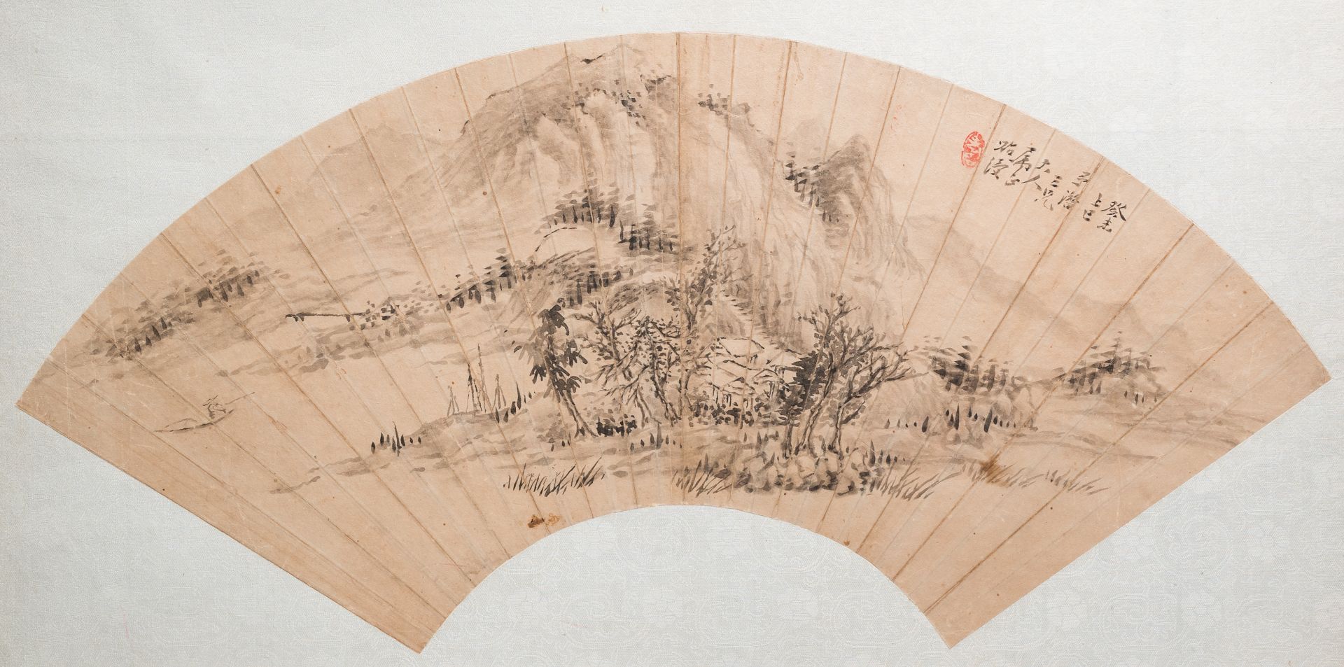 Chinese school: Mountainous landscape, ink on a fan leaf, dated 1883