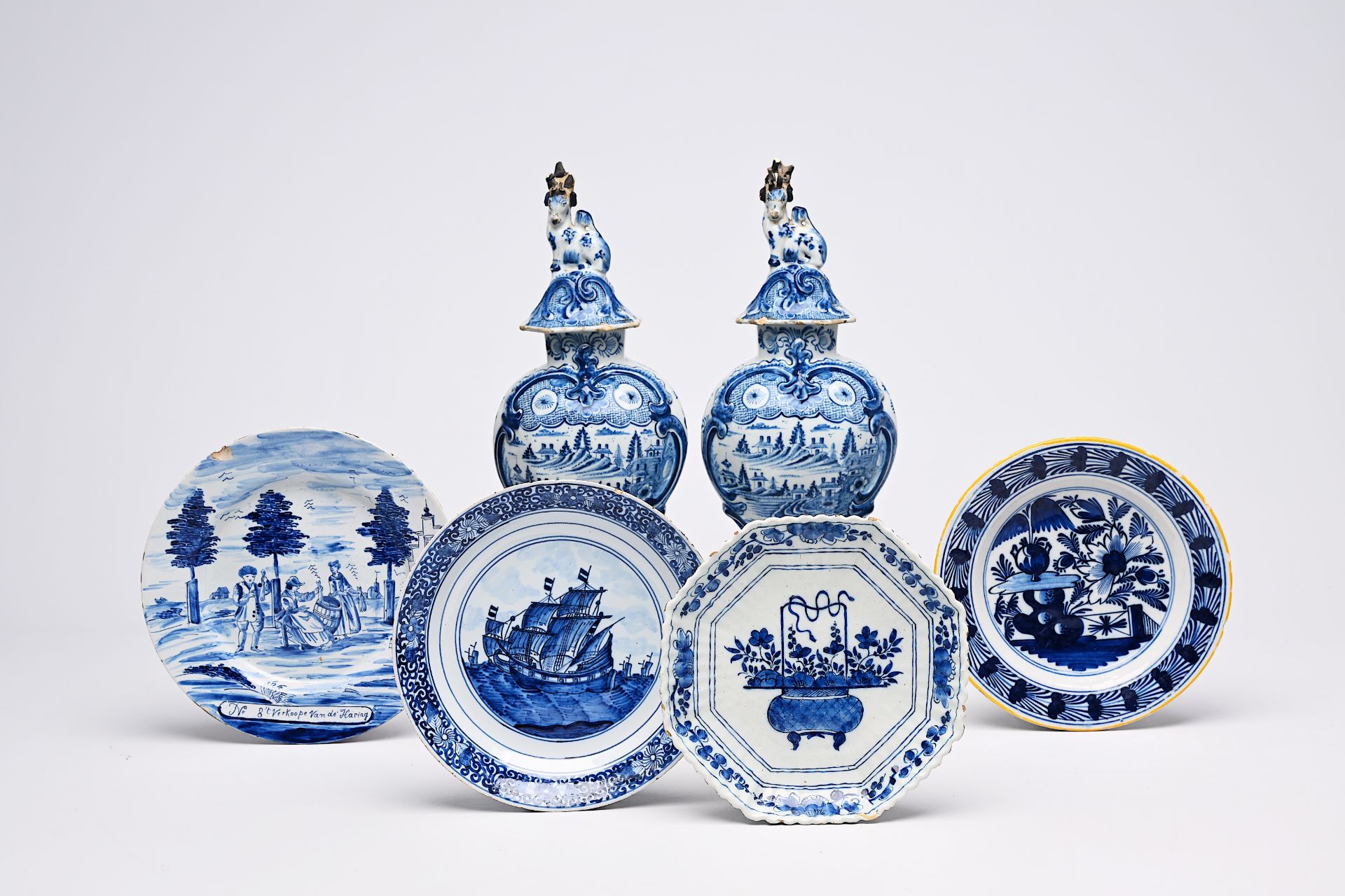 A pair of Dutch Delft blue and white vases and covers with landscapes and four various plates, 18th/ - Image 2 of 13