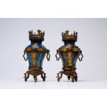 A pair of Chinese flambe glazed vases with gilt bronze mounts, 19th C.