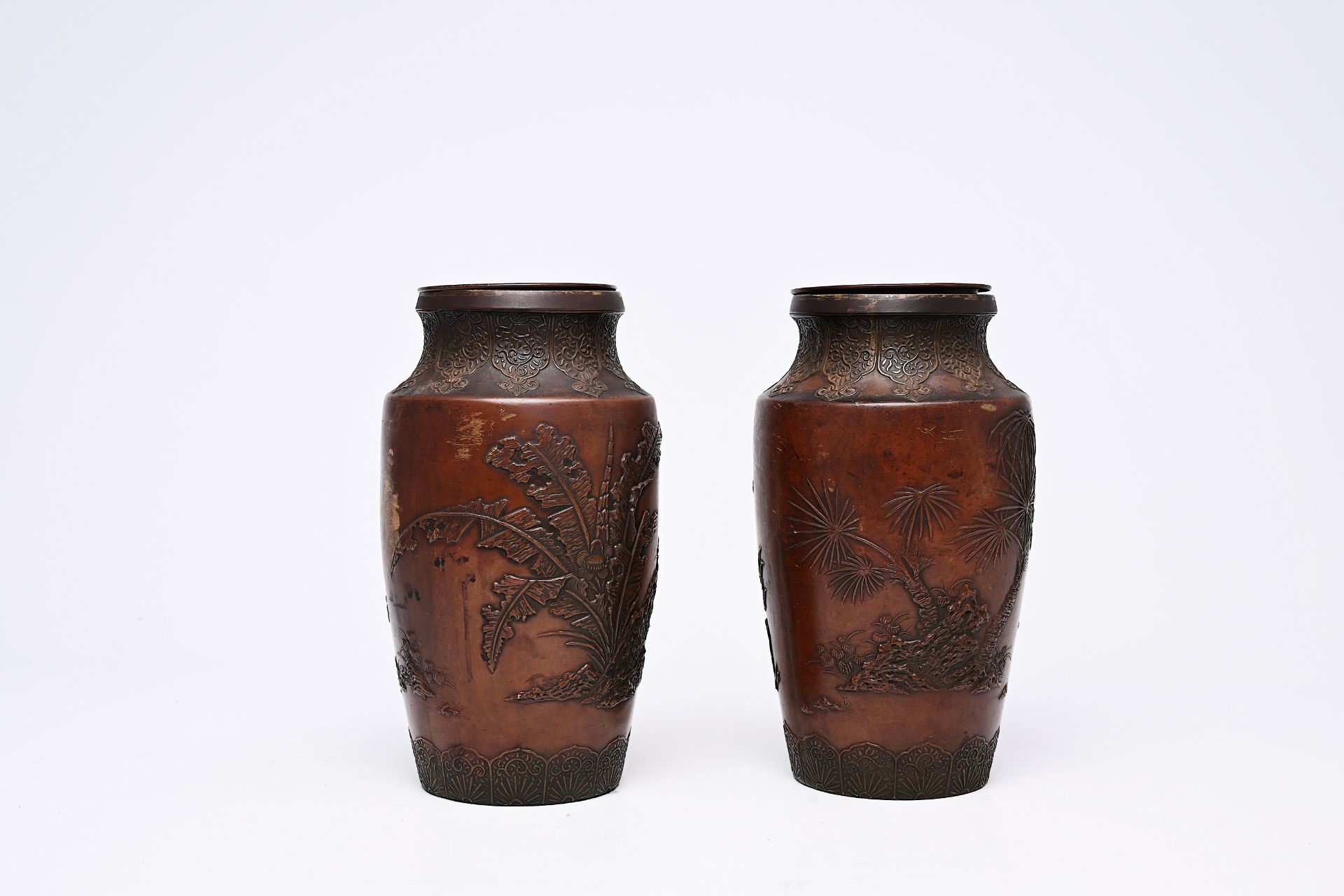 A pair of Japanese bronze vases with relief design of demons in a landscape, Meiji, 19th/20th C. - Image 2 of 7