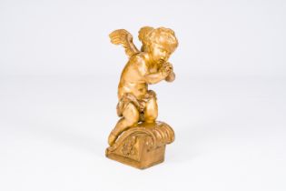 A carved wood angel with gilt design, 18th C.