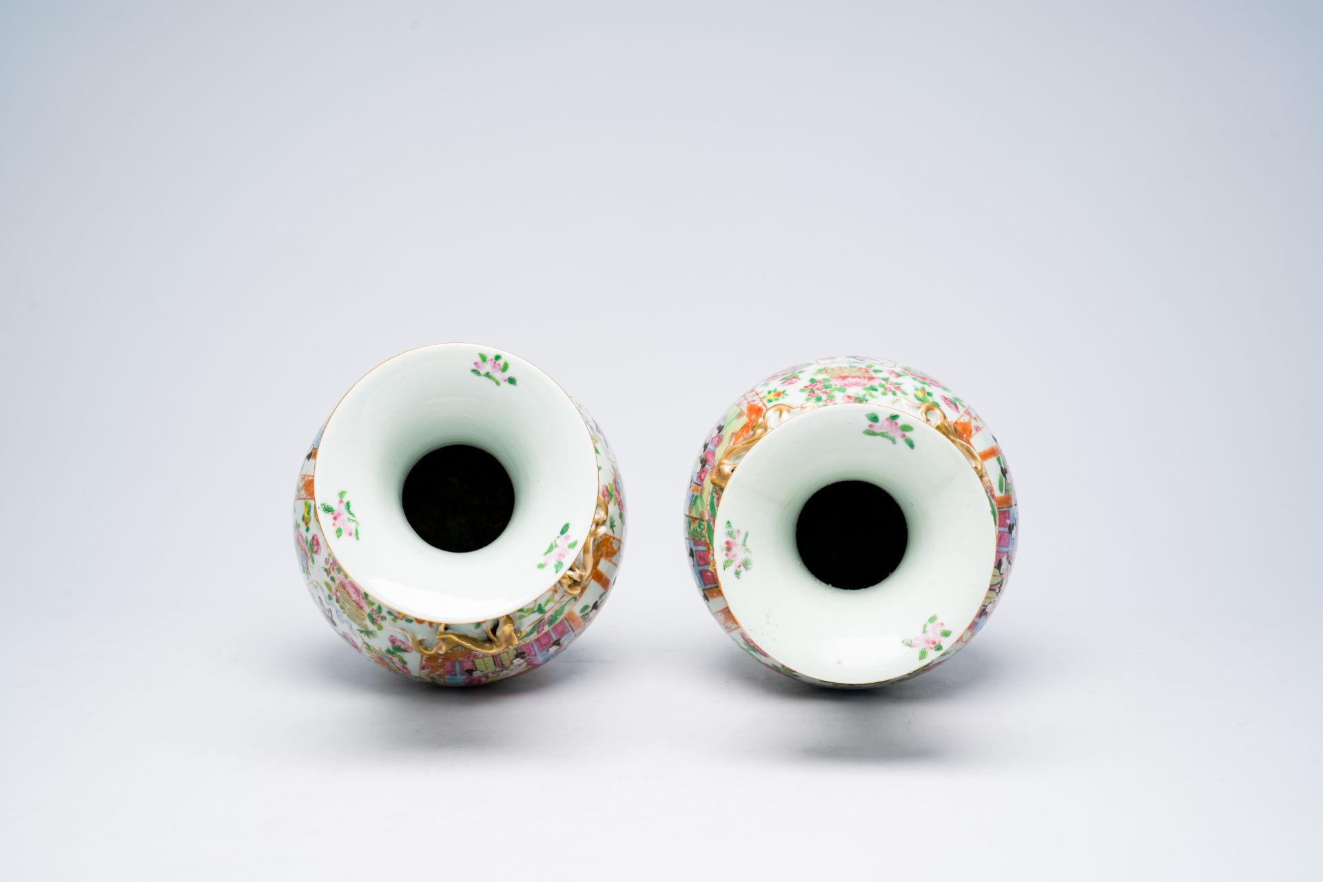 A pair of Chinese Canton famille rose vases with palace scenes, floral design and antiquities, 19th - Image 9 of 28