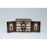 An elegant wood bone mounted miniature cabinet with figures and floral design, 17th/18th C.