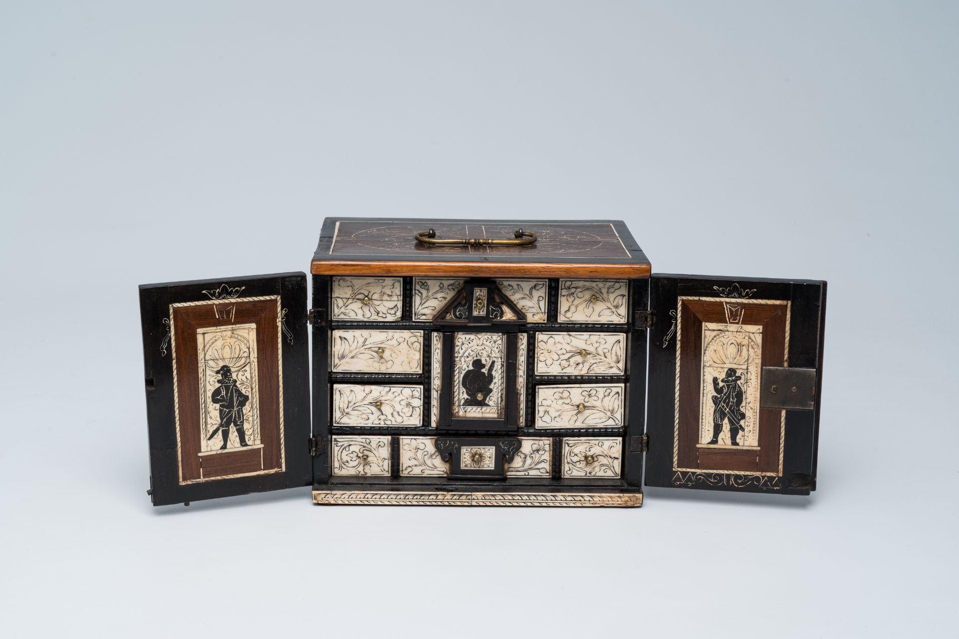 An elegant wood bone mounted miniature cabinet with figures and floral design, 17th/18th C.