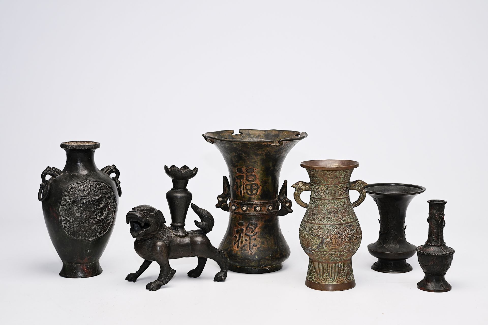 A varied collection of Chinese and Japanese bronze vases, Qing and 20th C.