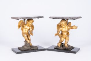 A pair of gilt wood angels transformed into wall consoles with marble top and bottom, 19th/20th C.