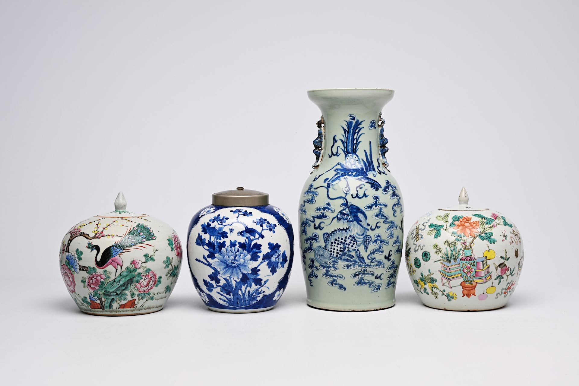 A Chinese blue and white celadon ground 'qilin and phoenix' vase and three famille rose, blue and wh