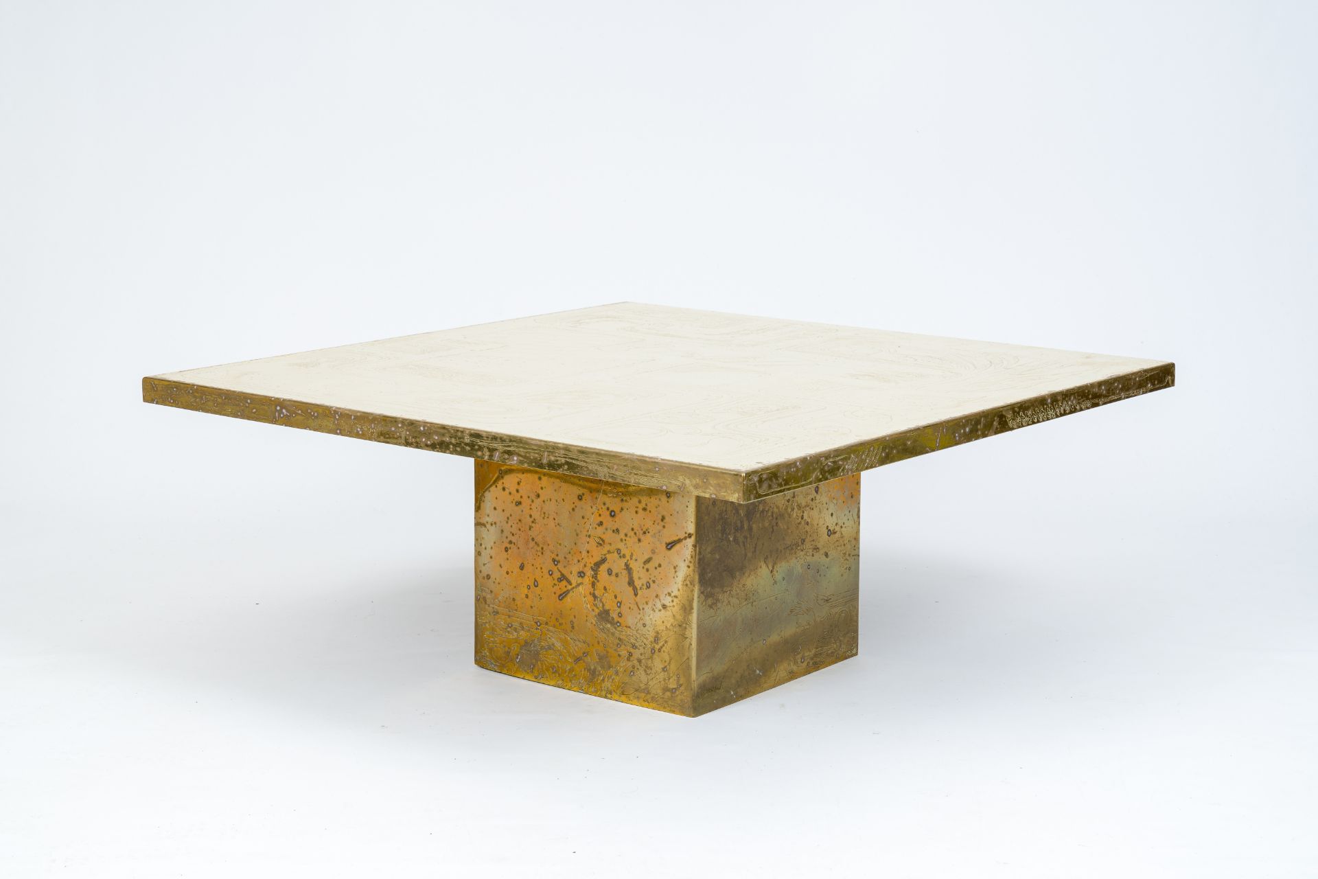 Christian Heckscher (1951): A design coffee table with an etched brass table top, 1970's/1980's