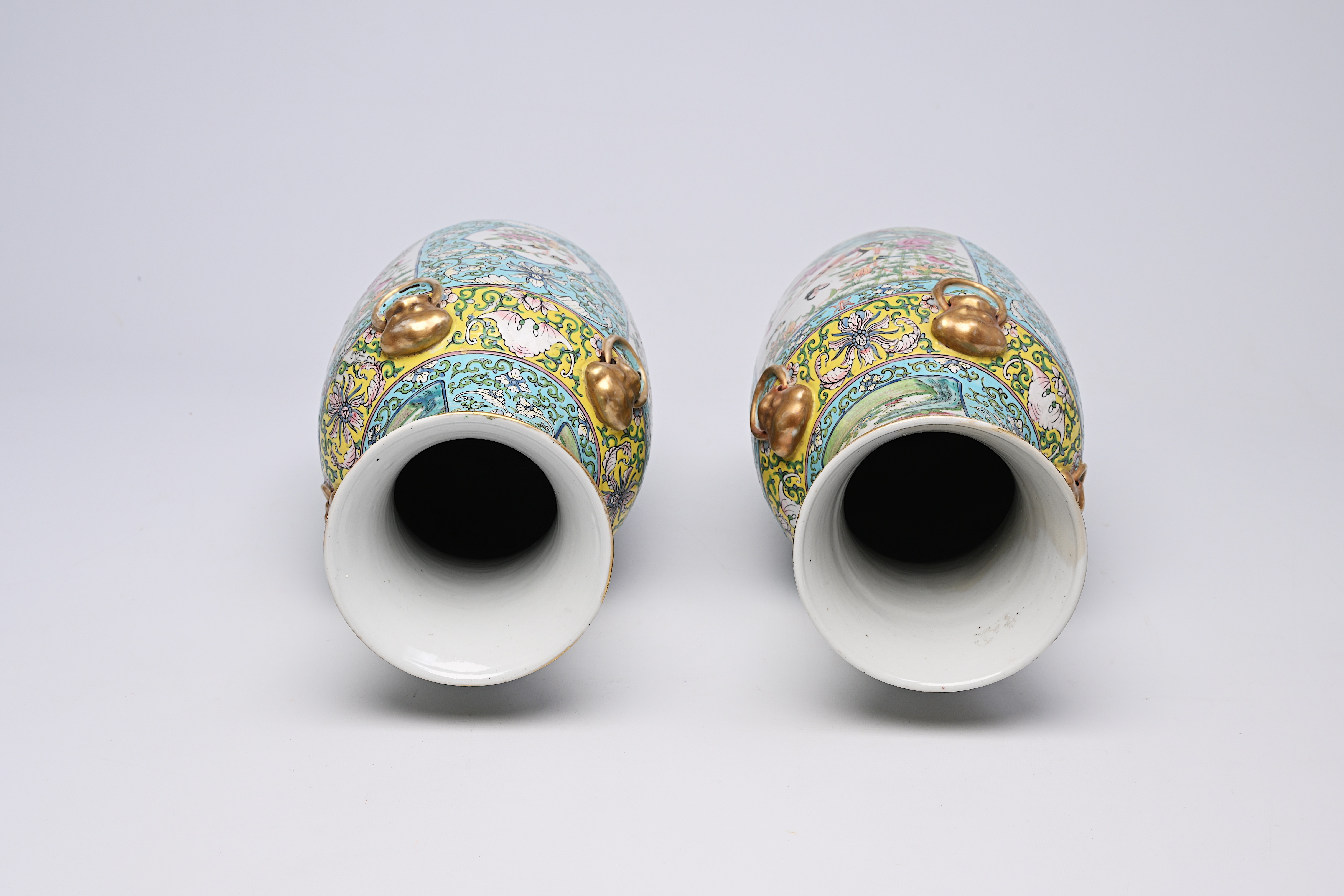A pair of Chinese Canton famille rose turquoise ground vases with birds and butterflies among blosso - Image 6 of 13