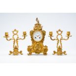 A French Louis XV style gilt bronze three-piece clock garniture, 19th C.