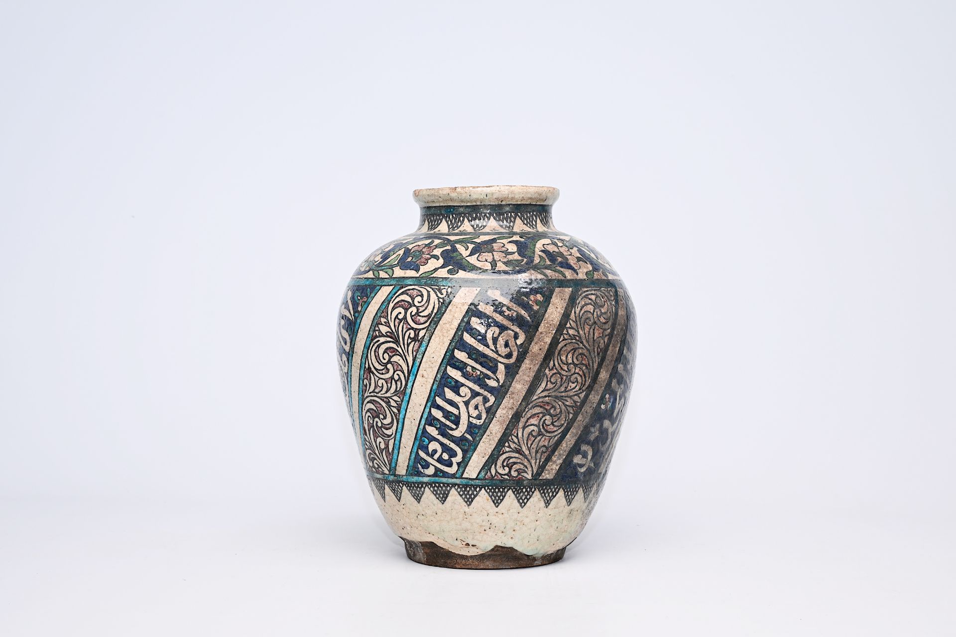 A polychrome pottery jar with floral and calligraphic design, Iran, 19th C. - Image 4 of 9