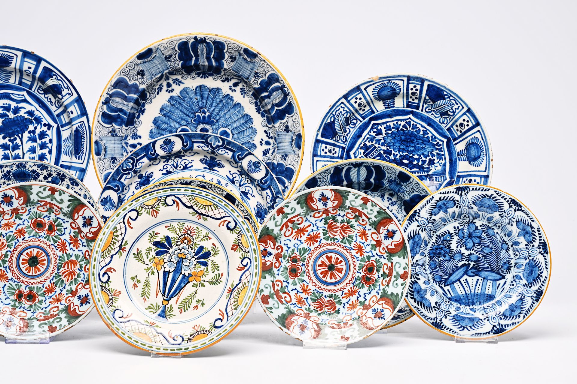 Twelve Dutch Delft blue and white and polychrome plates and dishes, 18th C. - Image 3 of 7