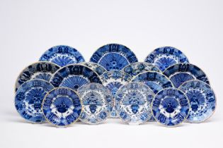 Sixteen Dutch Delft blue and white 'peacock tail' plates and dishes, 18th C.