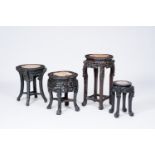 Four Chinese reticulated hardwood stands, 19th/20th C.