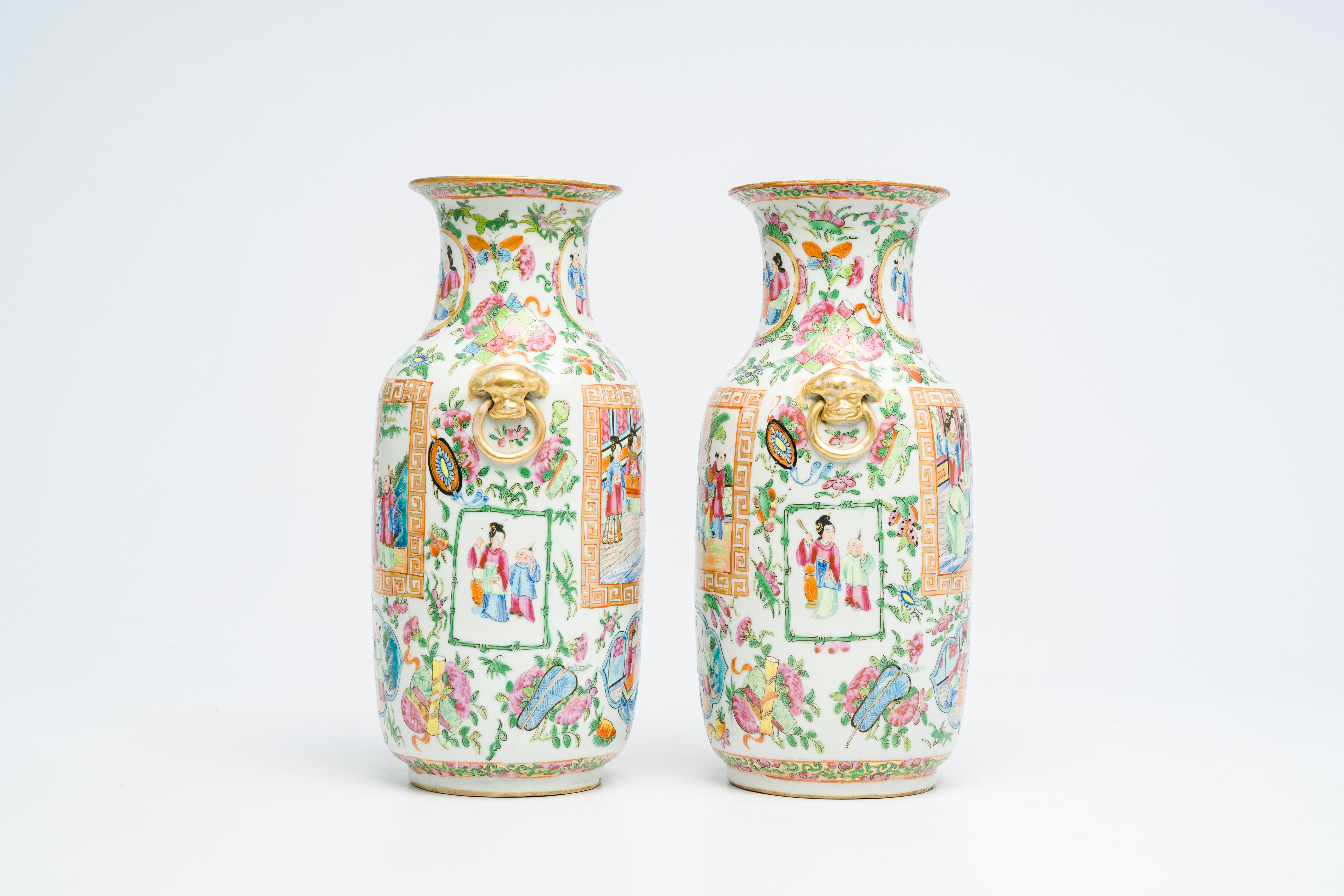 A pair of Chinese Canton famille rose vases with palace scenes and floral design, 19th C. - Image 4 of 6
