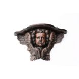 An exceptional Flemish carved wood 'angel' wall bracket, ca. 1700