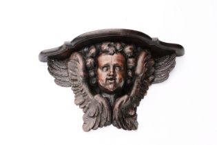 An exceptional Flemish carved wood 'angel' wall bracket, ca. 1700