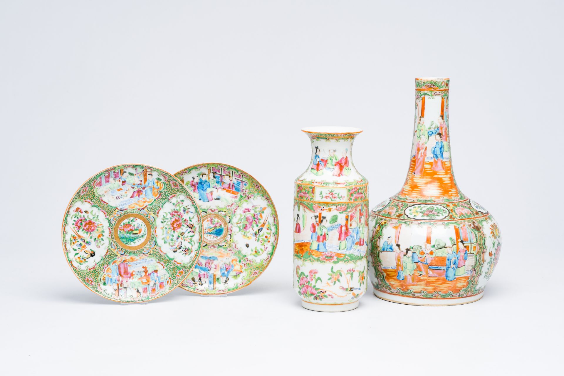 Two Chinese Canton famille rose vases and two plates, 19th C.