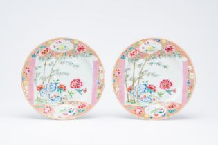 A pair of Chinese famille rose plates with a scroll with floral design, Yongzheng