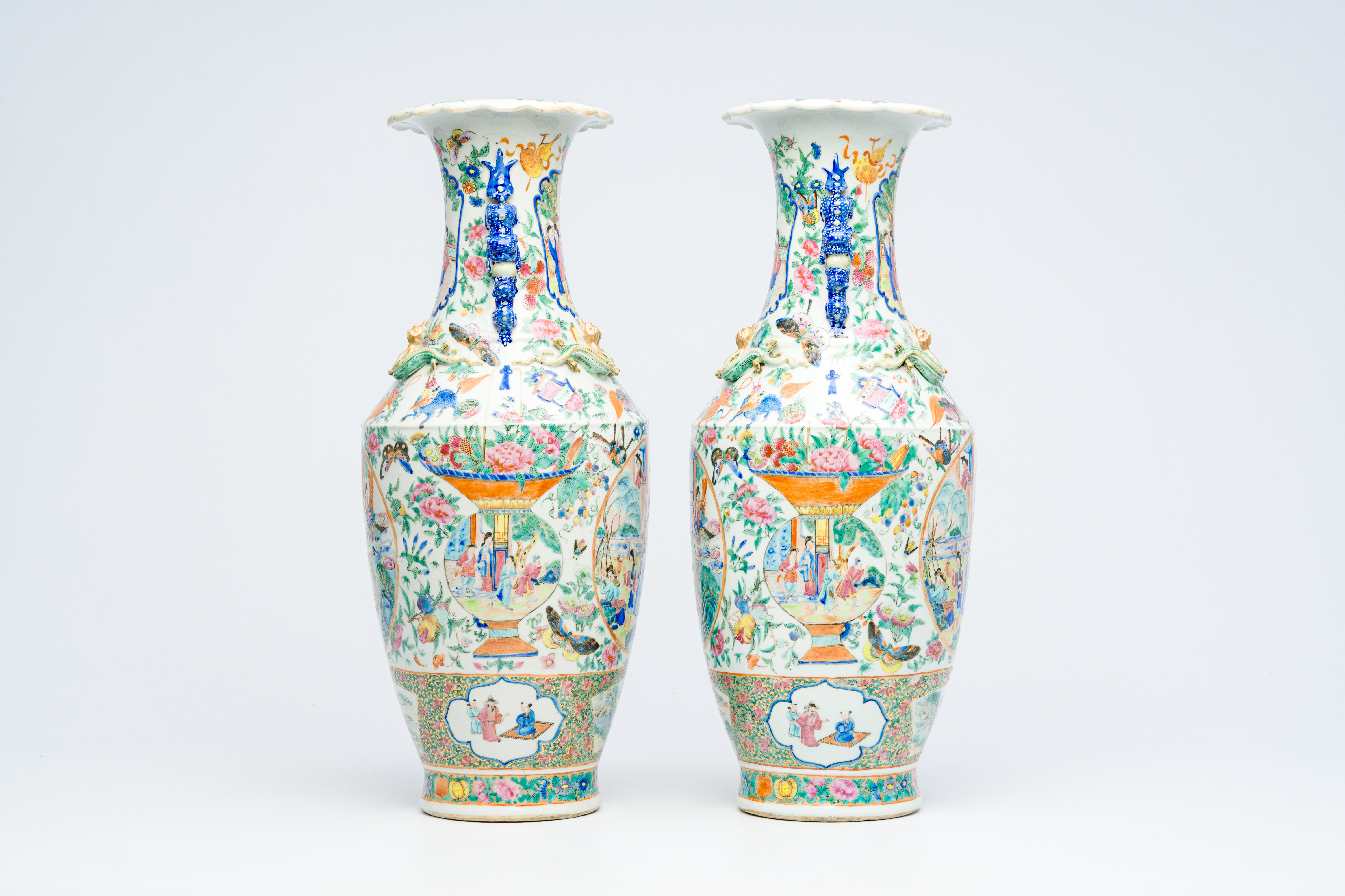 A pair of Chinese Canton famille rose vases with palace scenes, auspicious symbols and mythical anim - Image 4 of 6