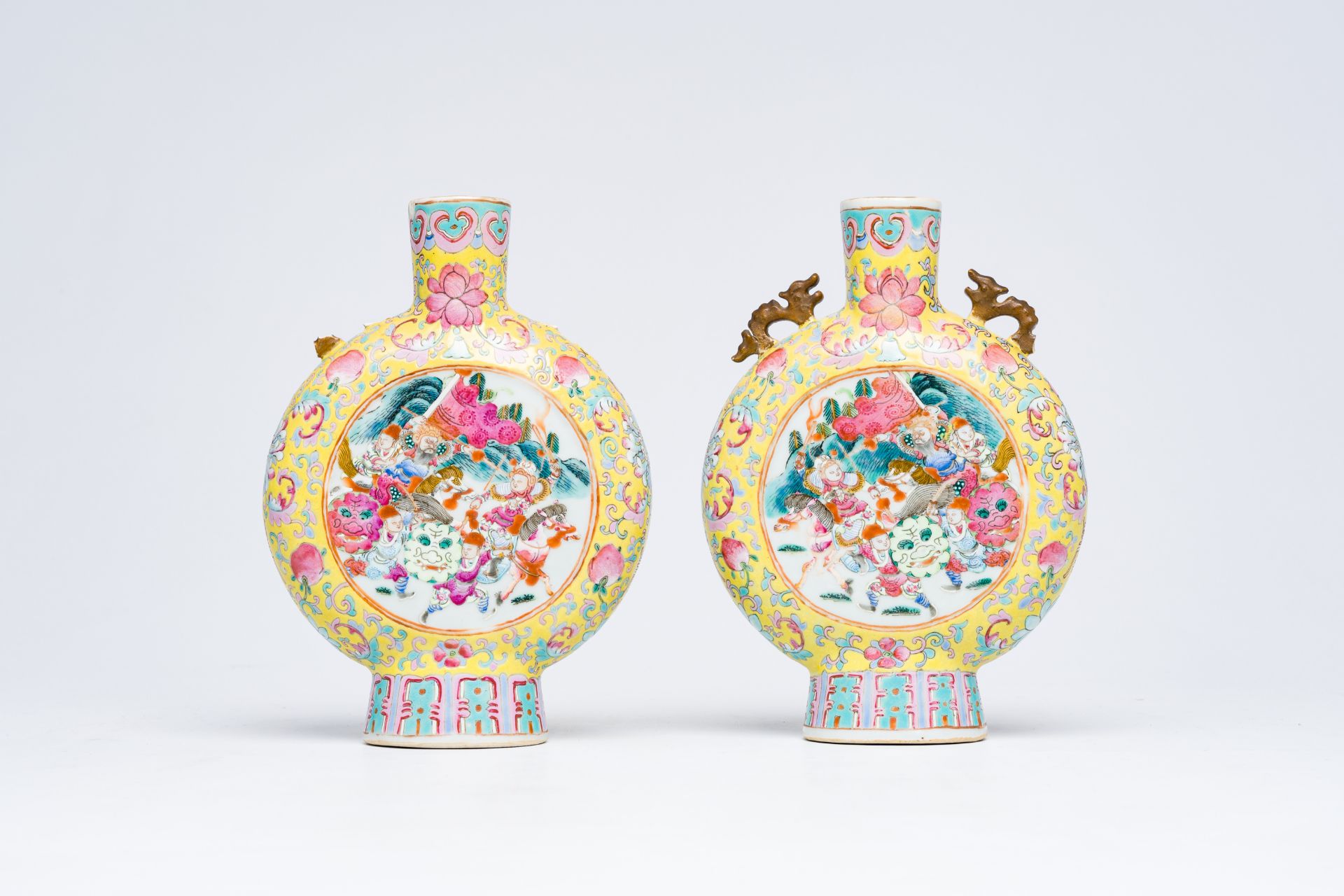A pair of Chinese famille rose yellow ground moon flasks with warrior scenes and pheasants among blo - Bild 2 aus 8
