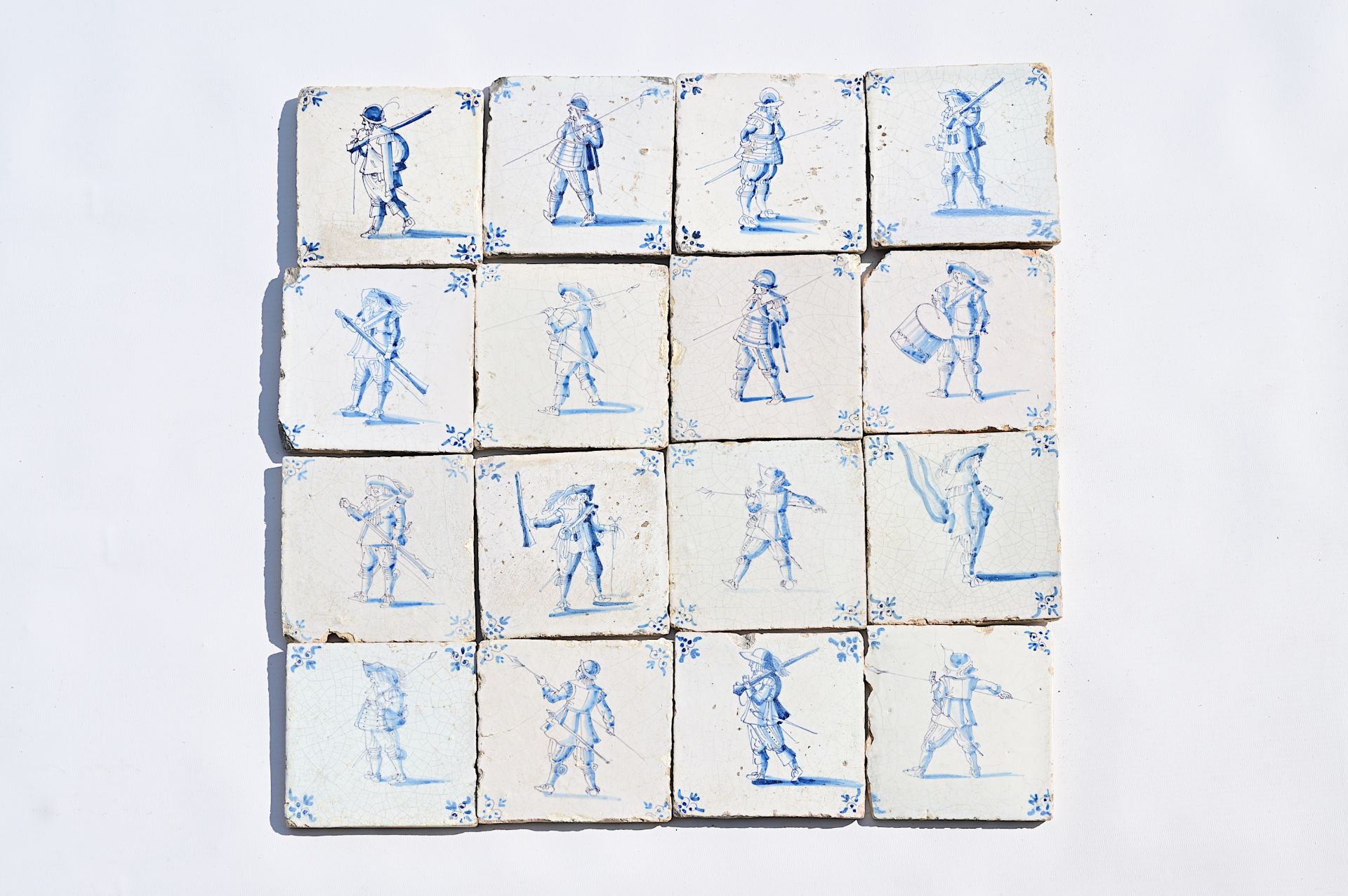 Sixteen Dutch Delft blue and white 'soldier' tiles, 17th C.