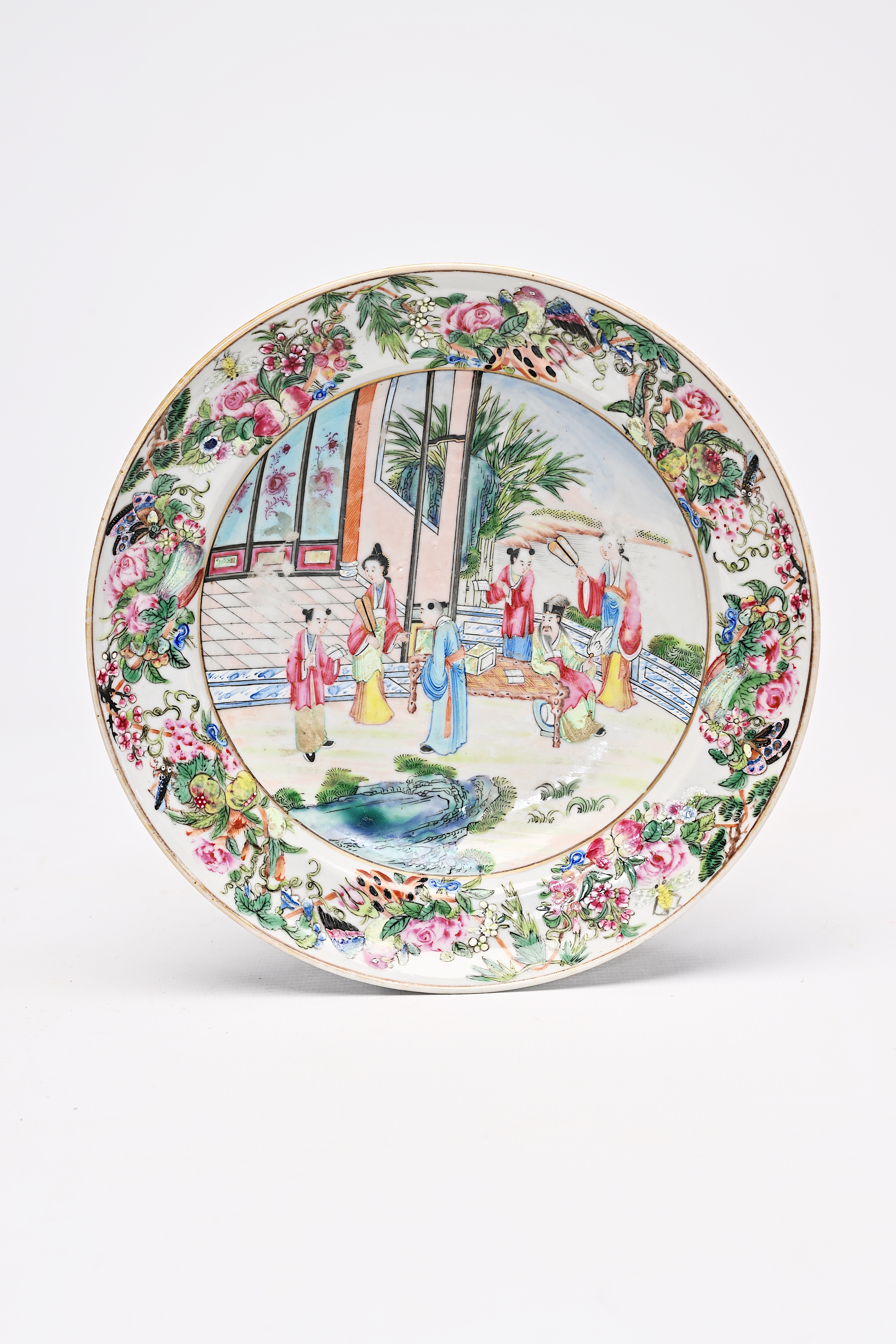 A fine Chinese Canton famille rose plate with a scholar at his desk, 19th C. - Image 3 of 4