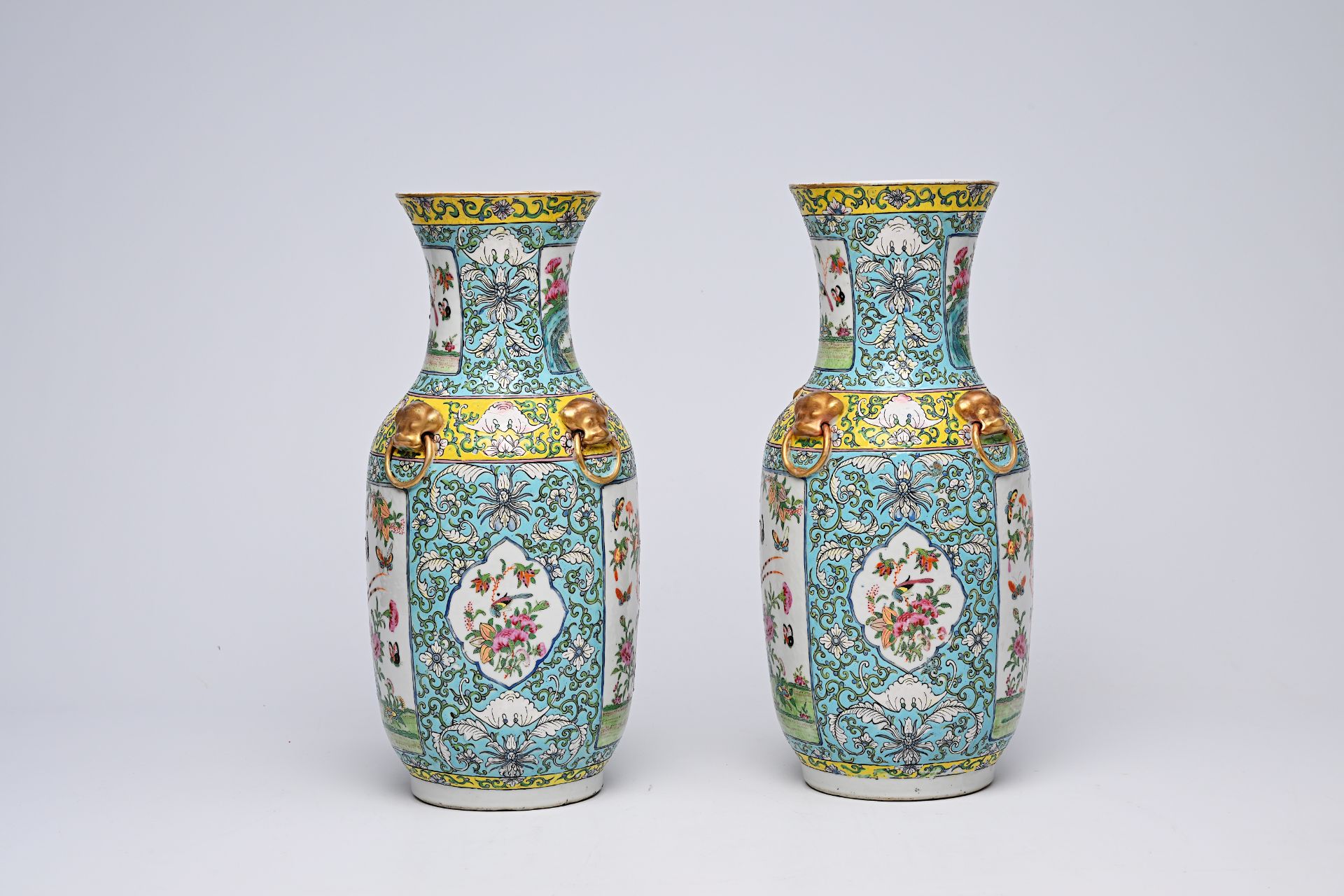 A pair of Chinese Canton famille rose turquoise ground vases with birds and butterflies among blosso - Bild 2 aus 13