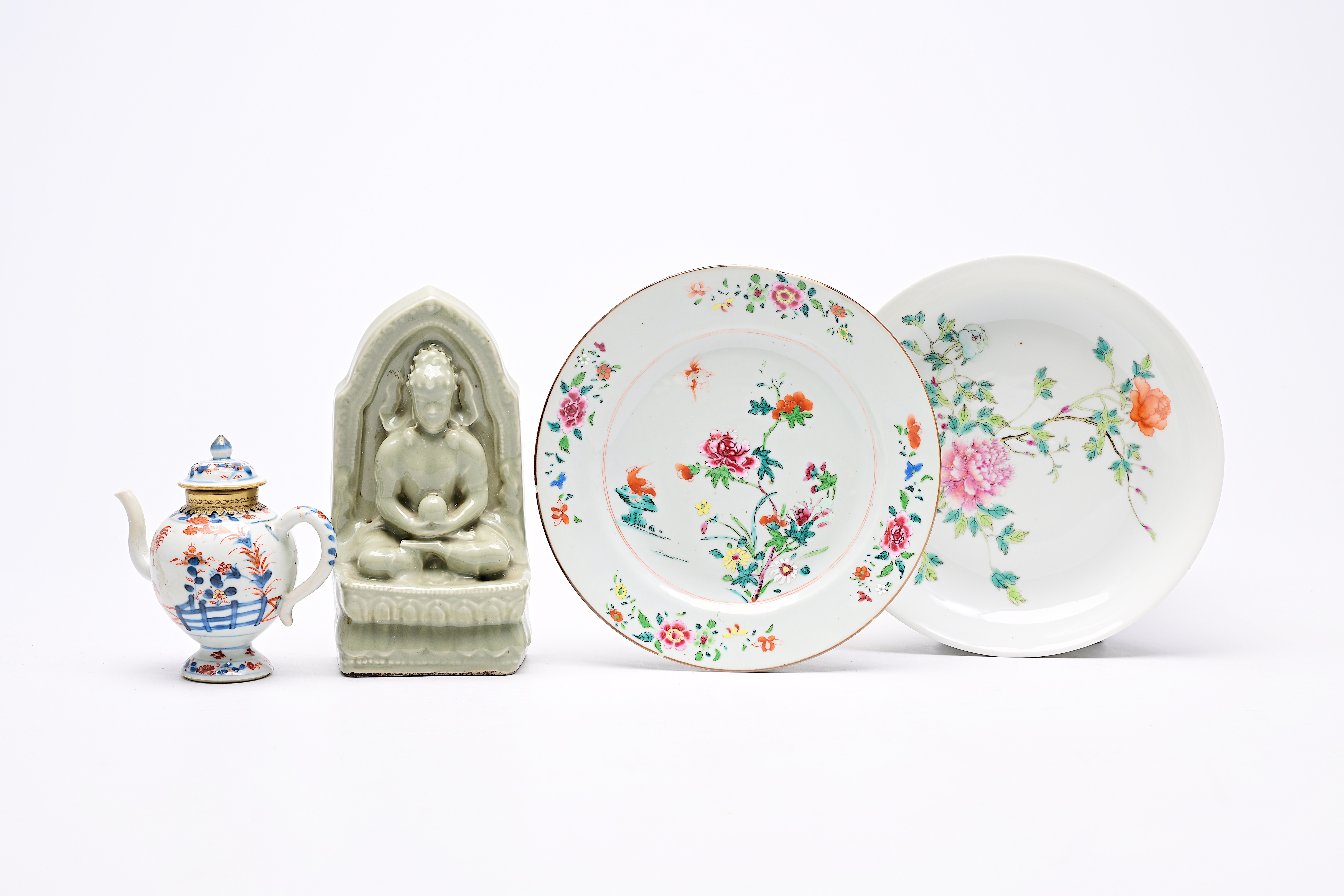 A Chinese Imari style teapot, two famille rose plates with floral design and a celadon 'Buddha' figu