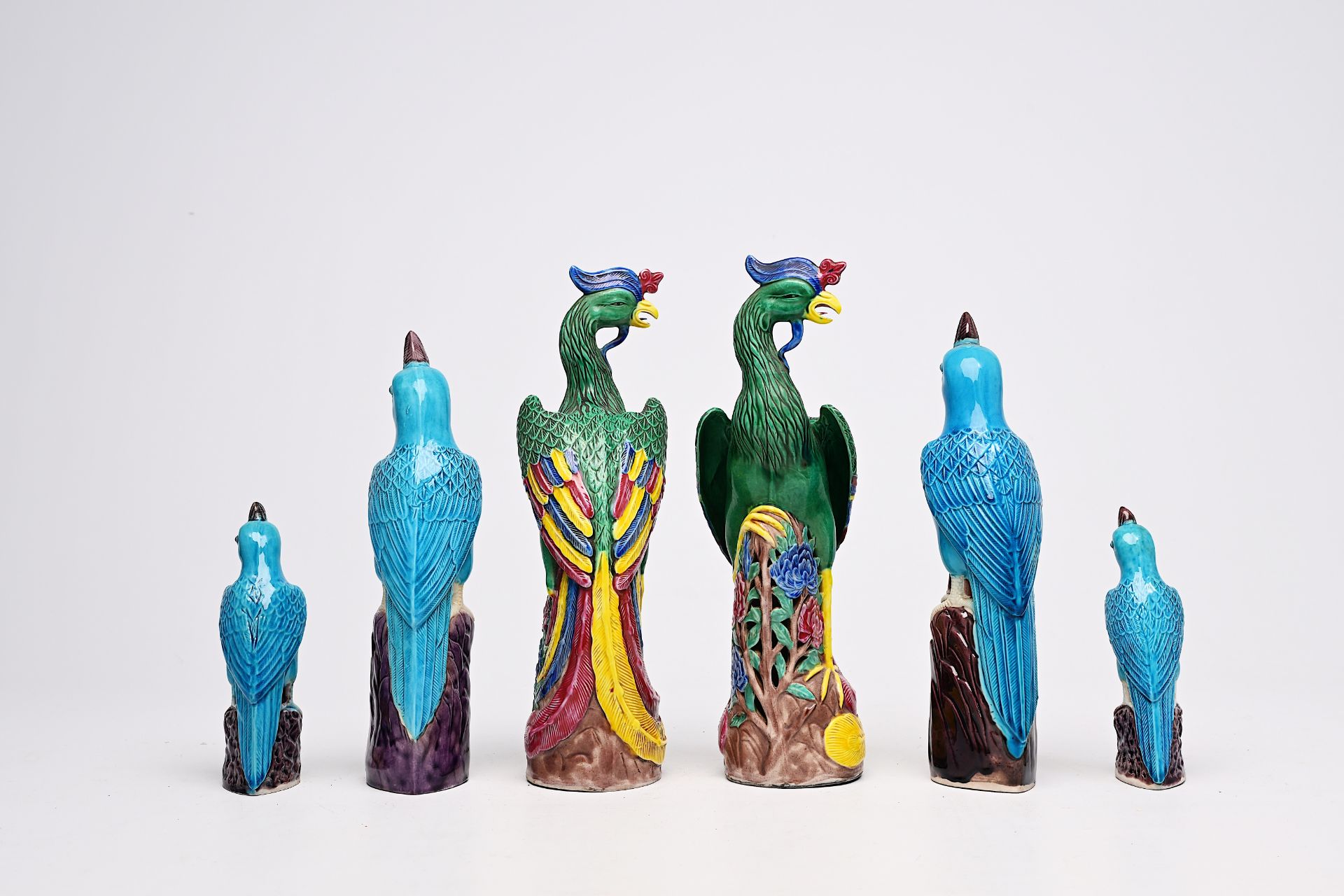 A pair of Chinese famille rose phoenixes, two pairs of turquoise parrots and nine blanc de Chine fig - Image 16 of 51