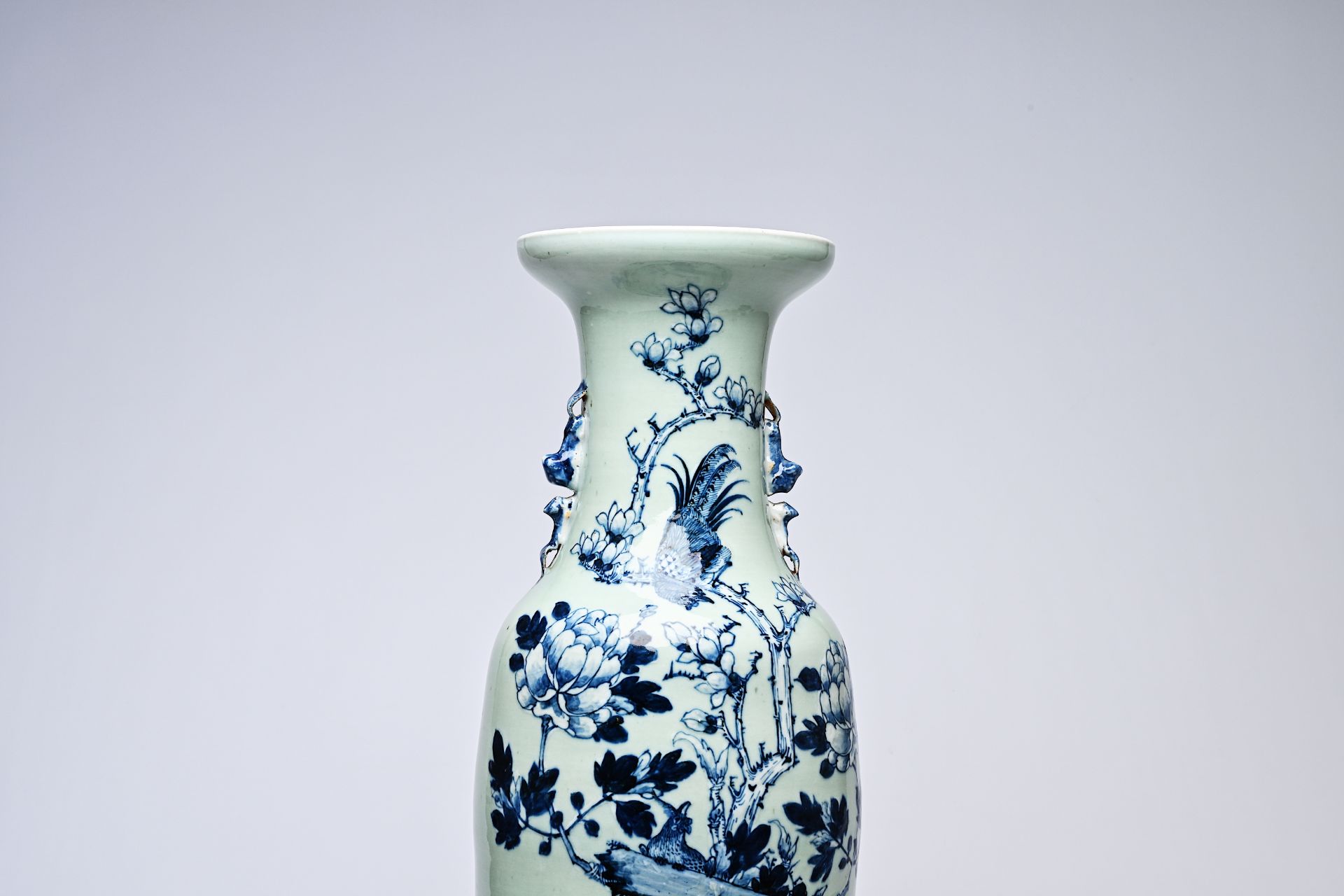 A Chinese blue and white celadon ground vase with birds among blossoming branches, 19th C. - Image 7 of 8