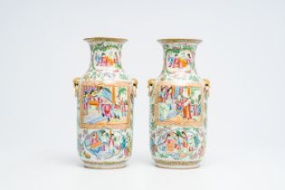 A pair of Chinese Canton famille rose vases with palace scenes and floral design, 19th C.