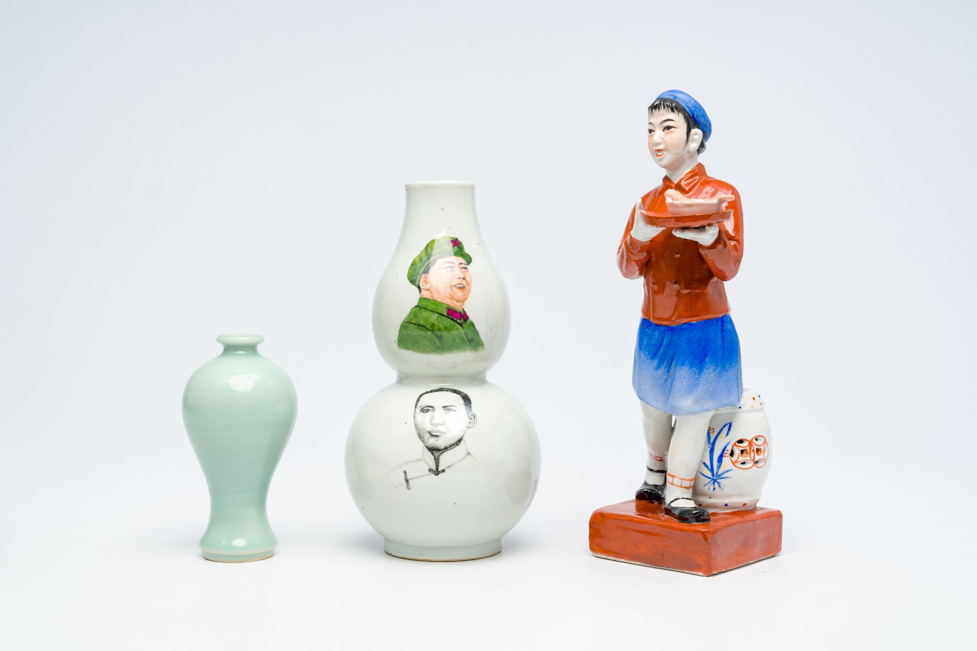 A Chinese monochrome celadon-glazed 'meiping' vase, a double gourd-shaped 'Mao' vase and a figure of