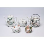 Five Chinese famille rose and qianjiang cai teapots and covers with floral and figurative design, 19
