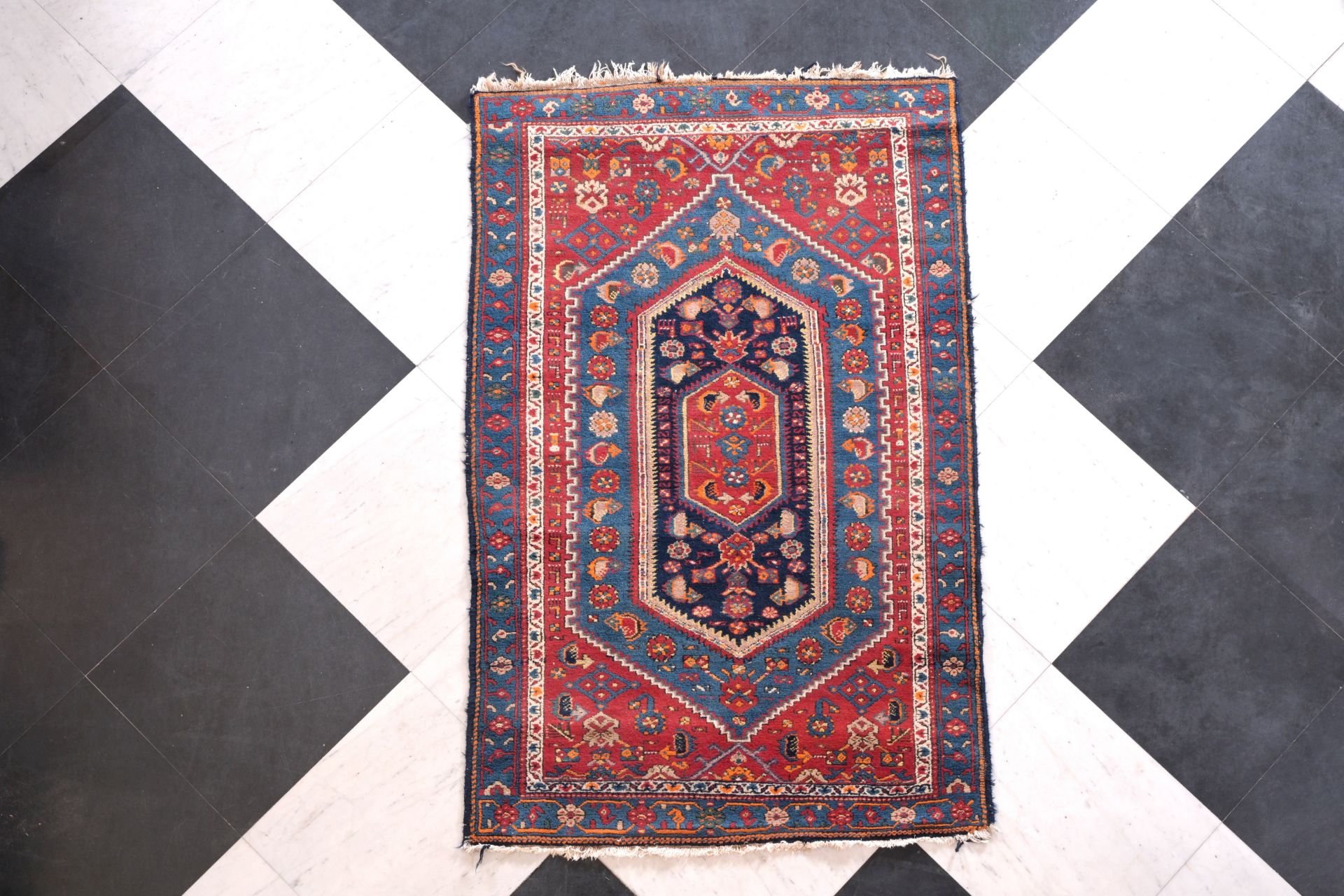 A Turkish rug with geometric design, wool on cotton, 20th C.