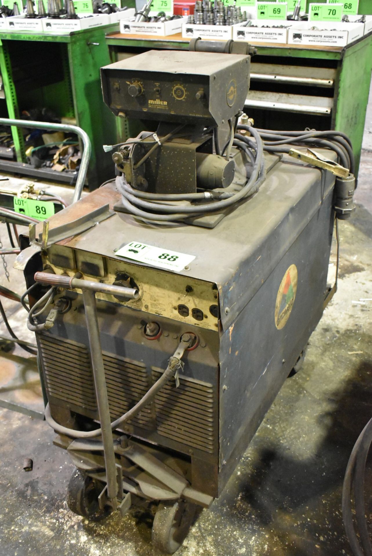 MILLER ARCWELD 300 MIG WELDER WITH CABLES AND GUN S/N: HK310773 [RIGGING FEE FOR LOT#88 - $35 USD