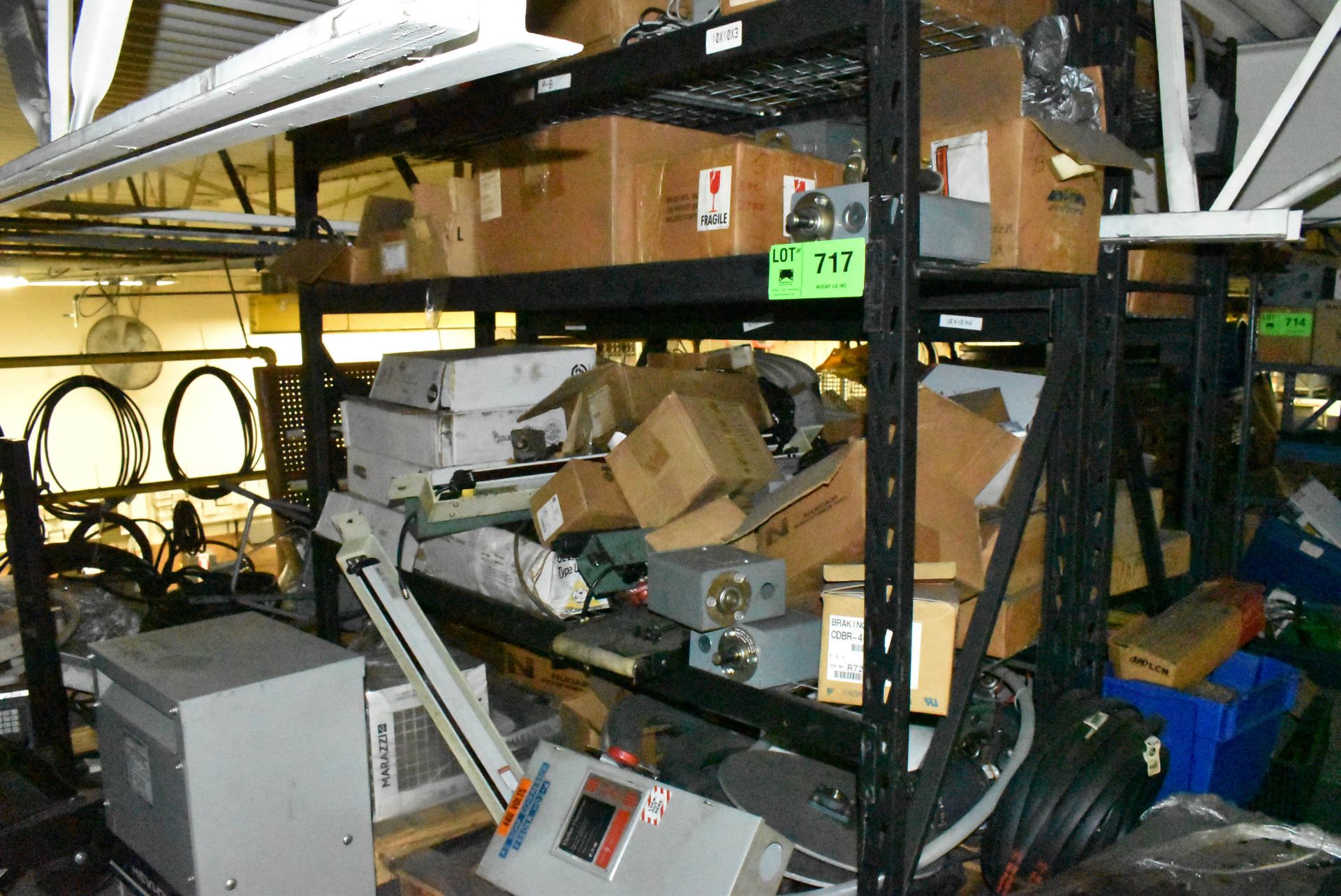 LOT/ ADJUSTABLE RACKS WITH CONTENTS - INCLUDING SPARE PARTS, ELECTRICAL COMPONENTS, SHUT OFF