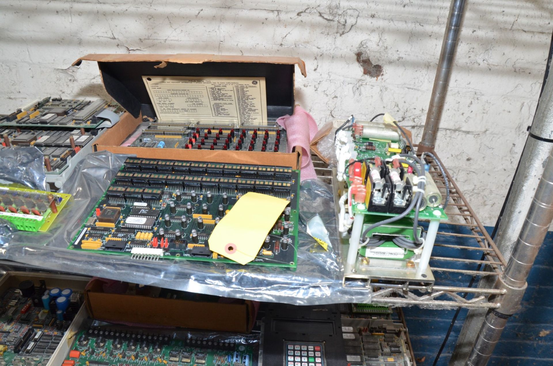 LOT/ ROLLING WIRE RACK WITH GE ELECTRONIC BOARDS, SPARE PARTS AND FUSES [RIGGING FEE FOR LOT # - Image 2 of 8