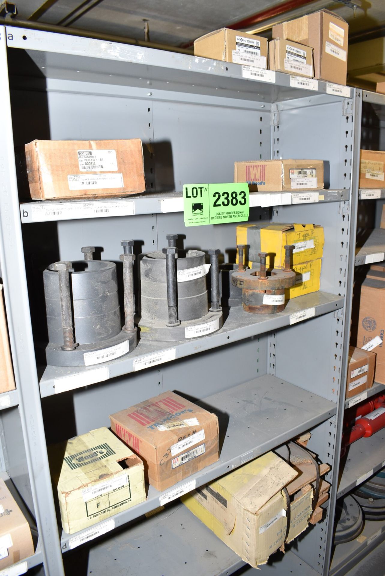 LOT/ CONTENTS OF SHELF - INCLUDING COUPLINGS, BUSHINGS, FLANGES, SPARE PARTS [RIGGING FEES FOR