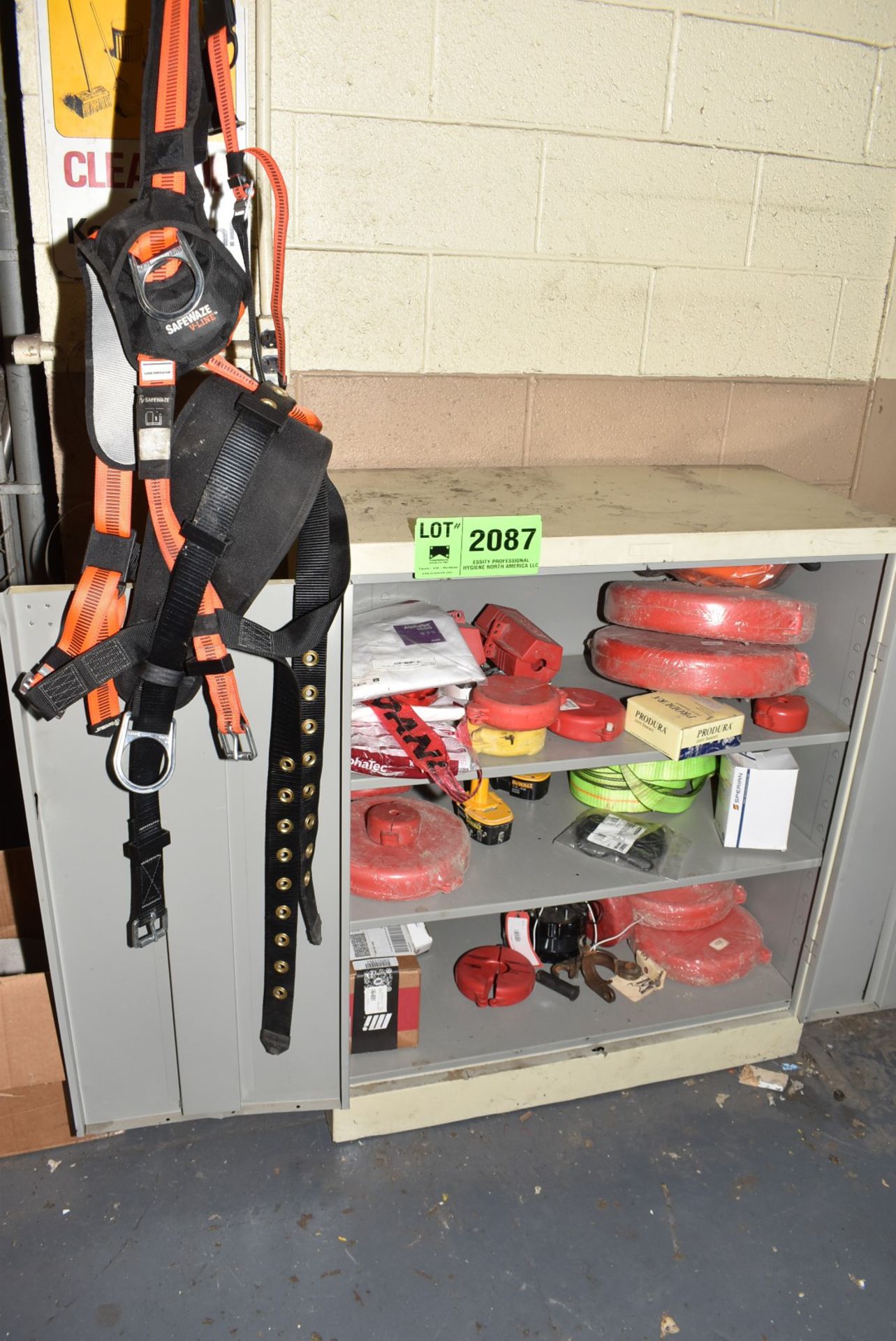 2 DOOR STORAGE CABINET WITH CONTENTS CONSISTING OF LOCK OUT BOXES AND SAFETY HARNESS [RIGGING FEES