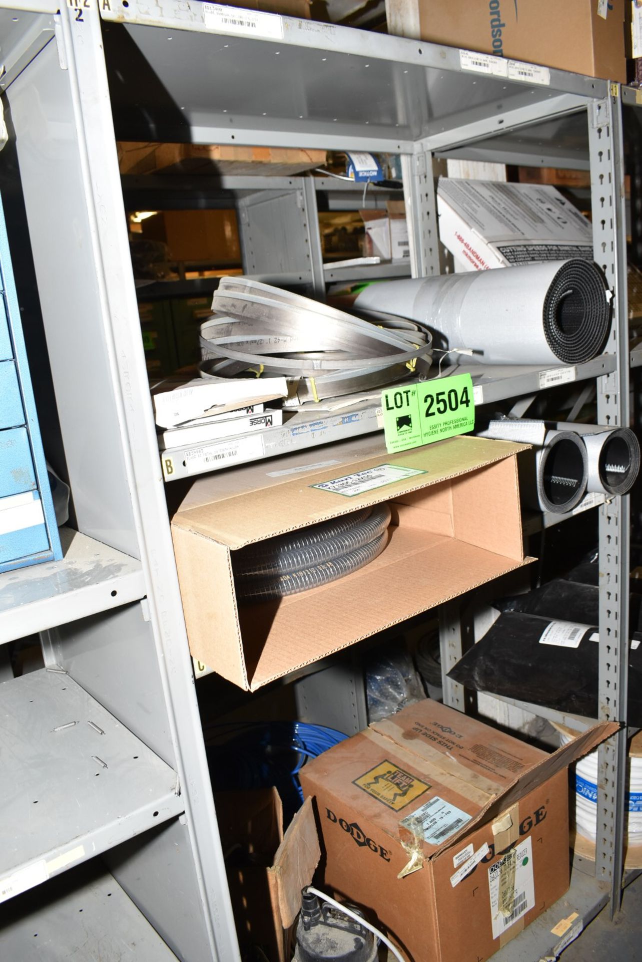 LOT/ CONTENTS OF SHELF - INCLUDING BAND SAW BLADES, CONVEYOR BELTING, POLYWIRE HOSE, SUMP PUMPS [