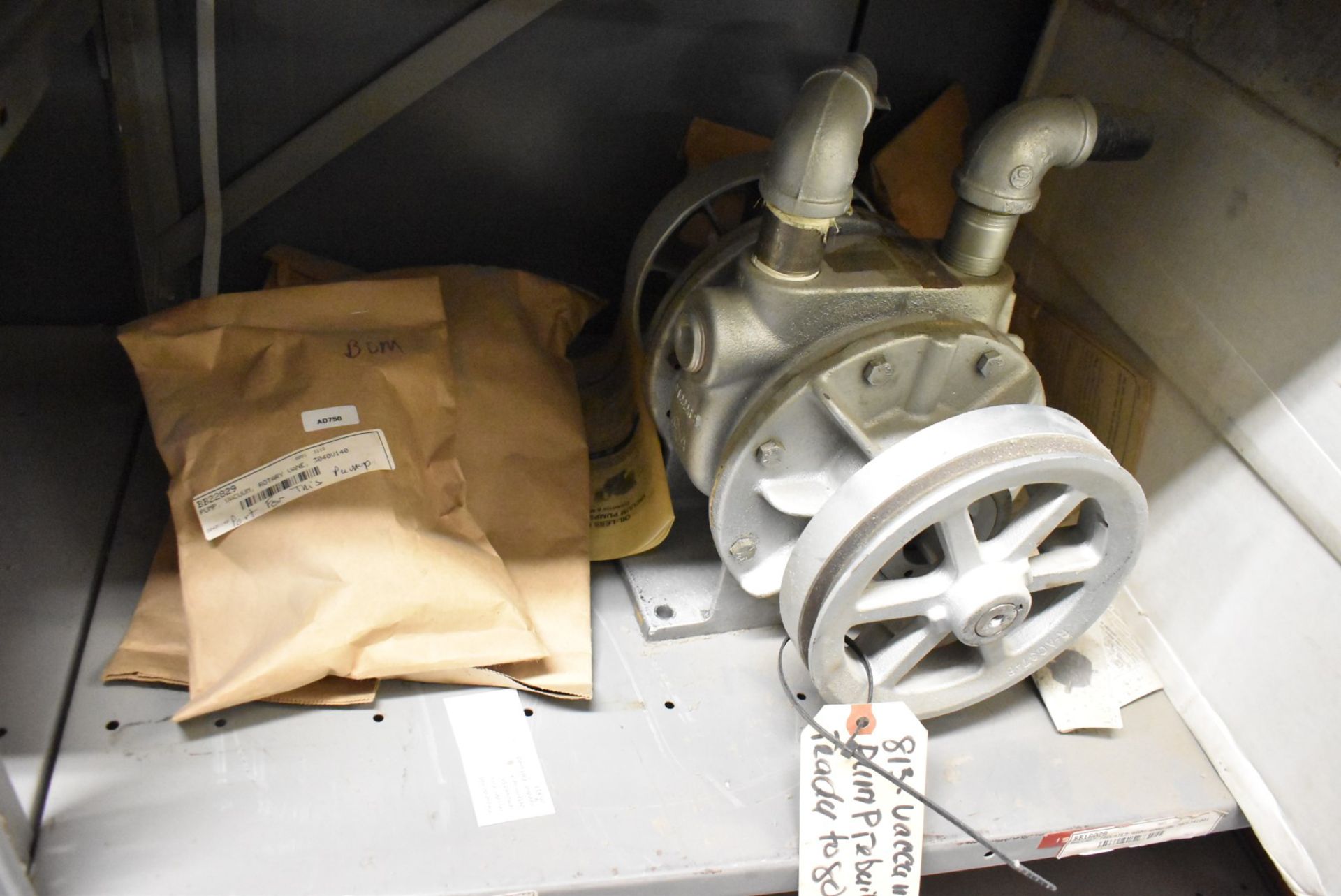 LOT/ CONTENTS OF SHELF - INCLUDING MOTOR CLUTCH, SPARE MOTOR, RELIANCE HR2000 DRIVE, ISOLATED - Image 5 of 6