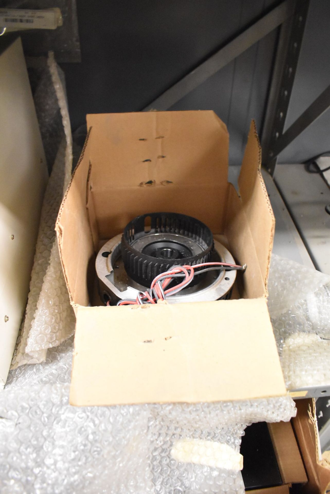 LOT/ CONTENTS OF SHELF - INCLUDING MOTOR CLUTCH, SPARE MOTOR, RELIANCE HR2000 DRIVE, ISOLATED - Image 3 of 6