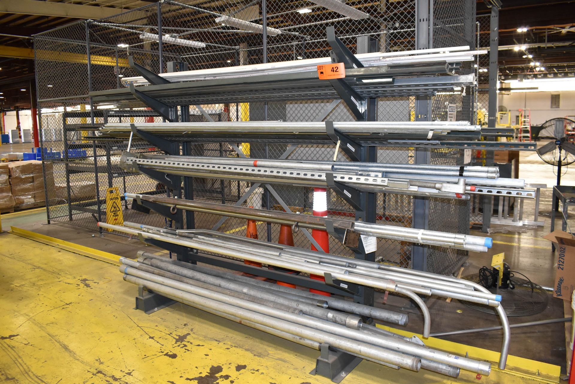 LOT/ 7 TIER ADJUSTABLE CANTILEVER MATERIAL RACK WITH CONTENTS CONSISTING OF CONDUIT AND META