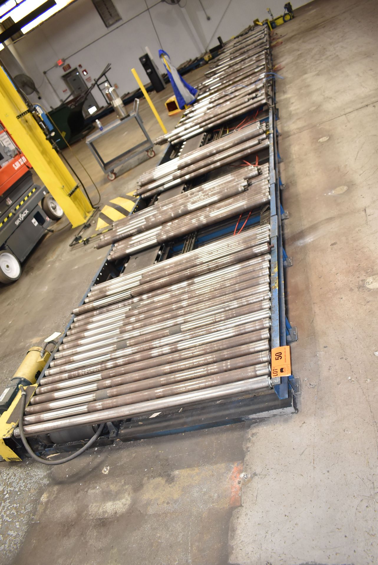 LOT/ MFG UNKNOWN APPROX 105' POWER ROLLER CONVEYOR WITH 59" ROLLS, (4) BALDOR .75HP ELECTRIC DRIVE