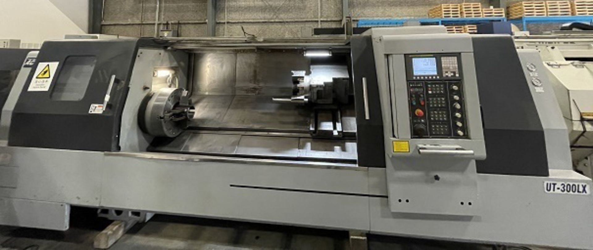 ACCUWAY (2012) UT-300LX CNC SLANT BED TURNING CENTER WITH FANUC 0I-TD CNC CONTROL, 22" 3-JAW