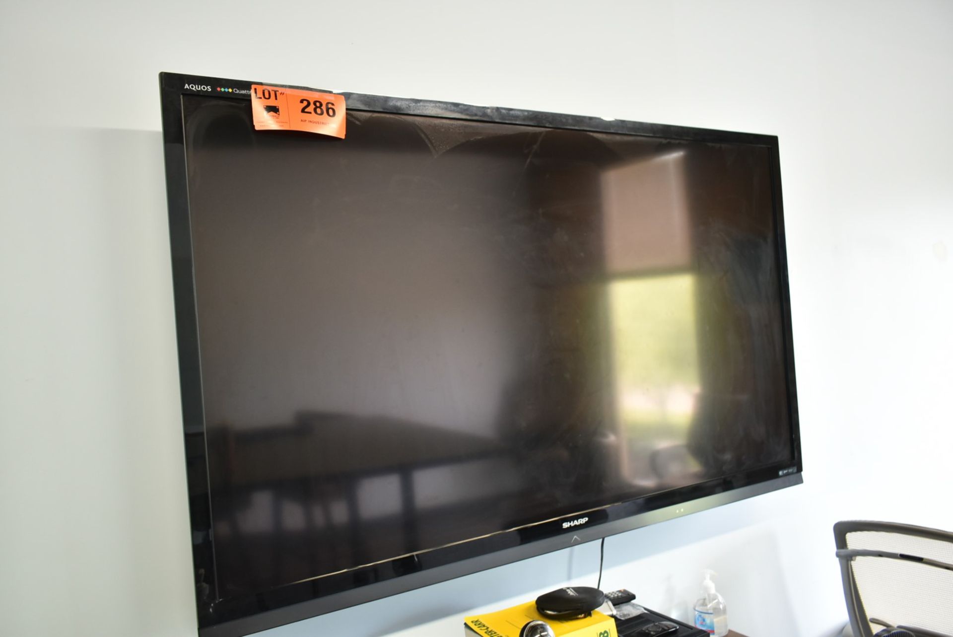 SHARP 60" FLAT SCREEN TV [RIGGING FOR LOT #286 - $25 CAD PLUS APPLICABLE TAXES]