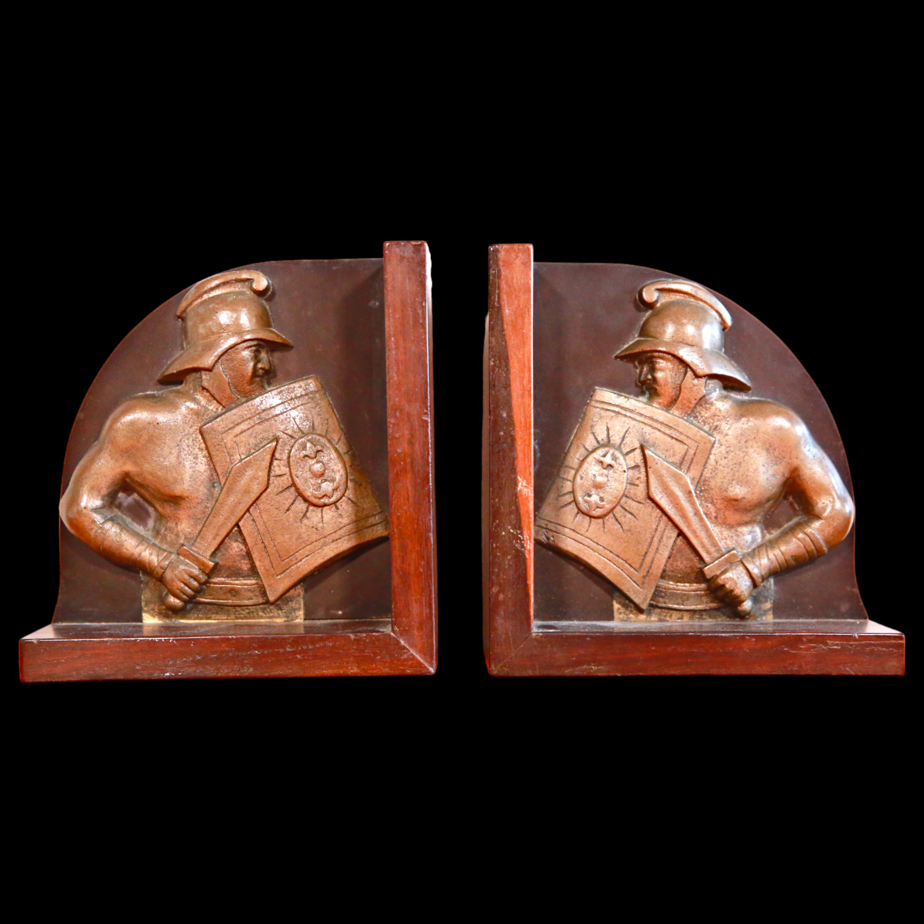 Vintage two wooden book supports, decorated with images of gladiators, 1930s, Italy.