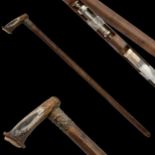 A rare Walking Stick Cane of a Doctor with a medical instruments inside, early 20th century.